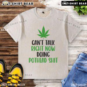Washed cannabis-themed t-shirt with 'Top Can't Talk Right Now, Doing Pothead Shit' printed in bold lettering.