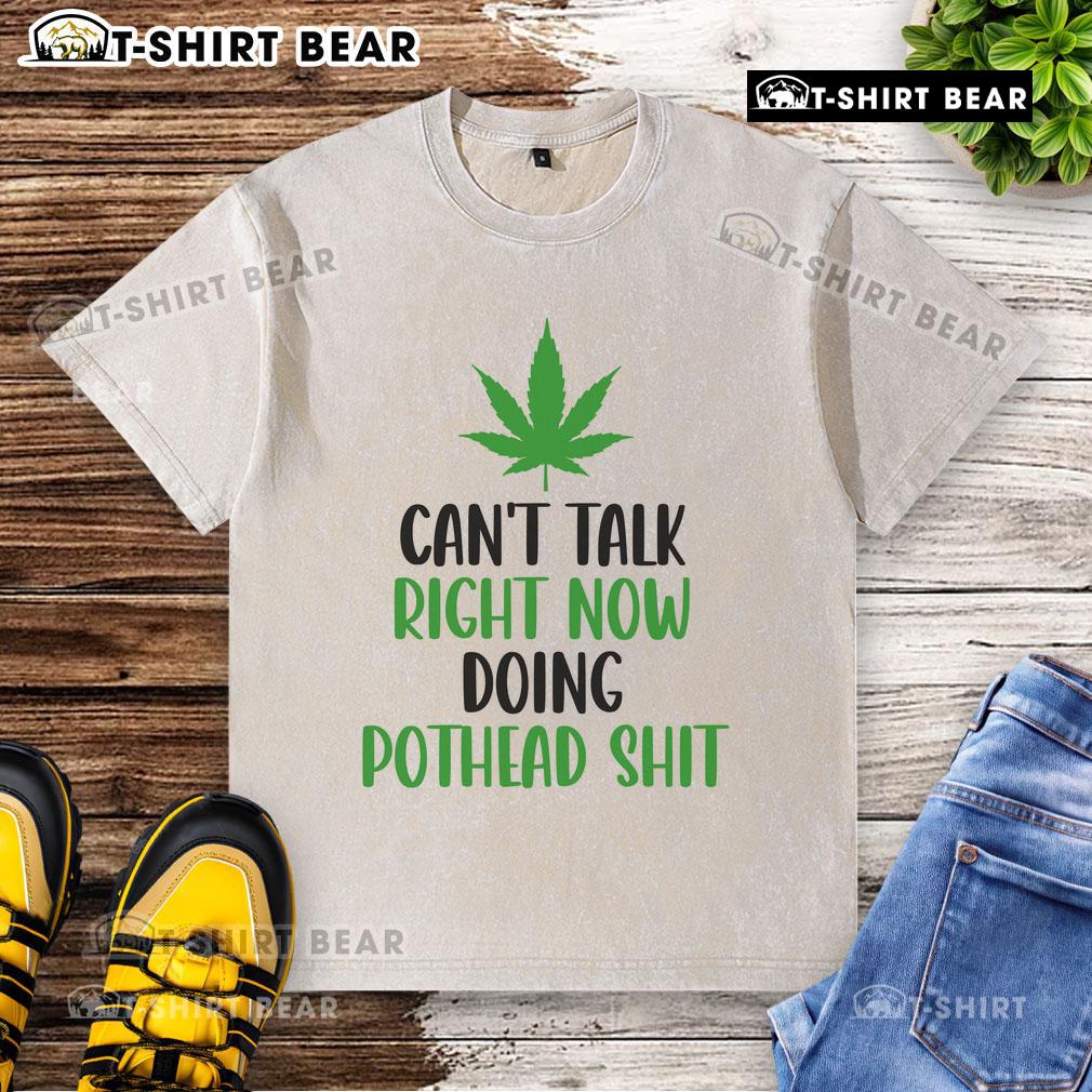 Washed cannabis-themed t-shirt with 'Top Can't Talk Right Now, Doing Pothead Shit' printed in bold lettering.