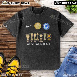 Top Chelsea FC FIFA Club World Cup Champions 'We've Won It All' washed t-shirt displayed on a wooden background.
