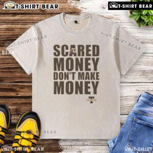 Top Coach T-shirt featuring 'Scared Money Don't Make Money' slogan, perfect for casual wear and motivational style.