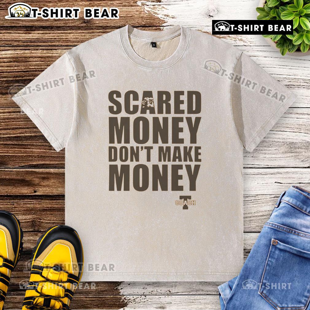 Top Coach T-shirt featuring 'Scared Money Don't Make Money' slogan, perfect for casual wear and motivational style.