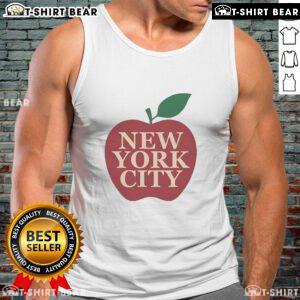 Eric Stonestreet wearing a stylish apple tank top in New York City, showcasing his trendy summer fashion.