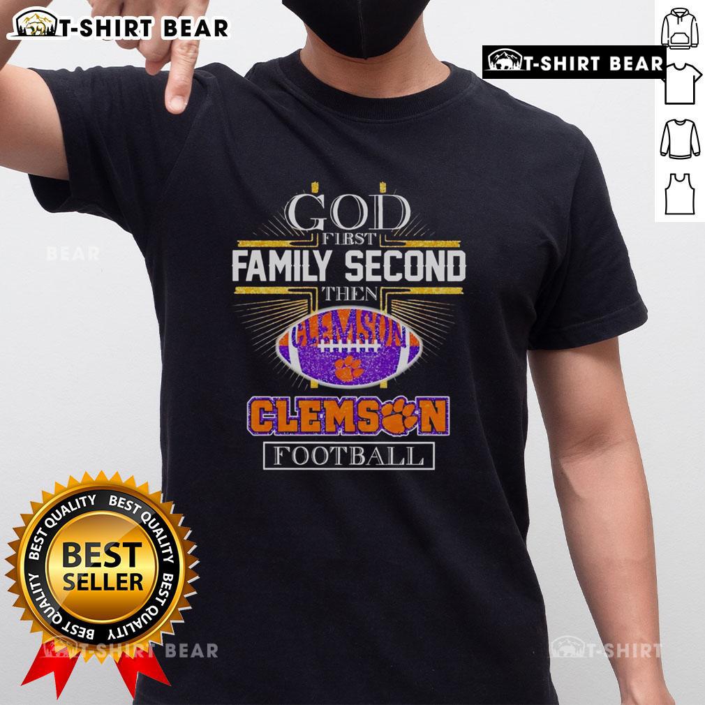 Top God First Family Second Then Clemson Football T-Shirt design featuring bold text in Clemson colors on a casual tee.