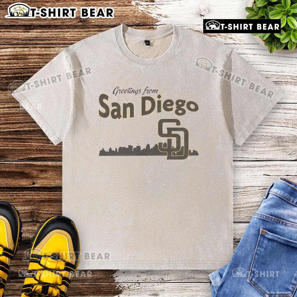 Alt Text: Top Greetings From San Diego Padres Skyline Washed T-Shirt featuring vibrant city skyline and Padres logo.