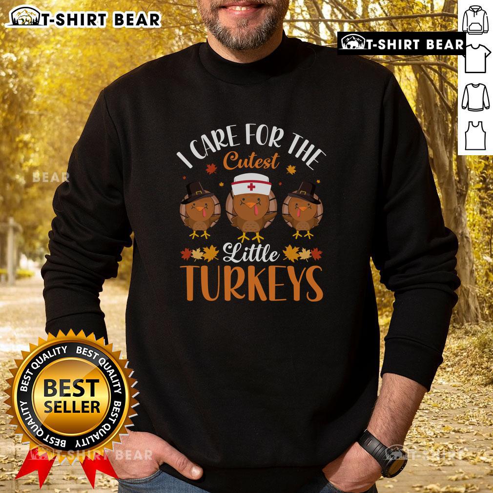 Alt Text: Cute Thanksgiving sweatshirt featuring adorable little turkeys, perfect for holiday celebrations and cozy gatherings.