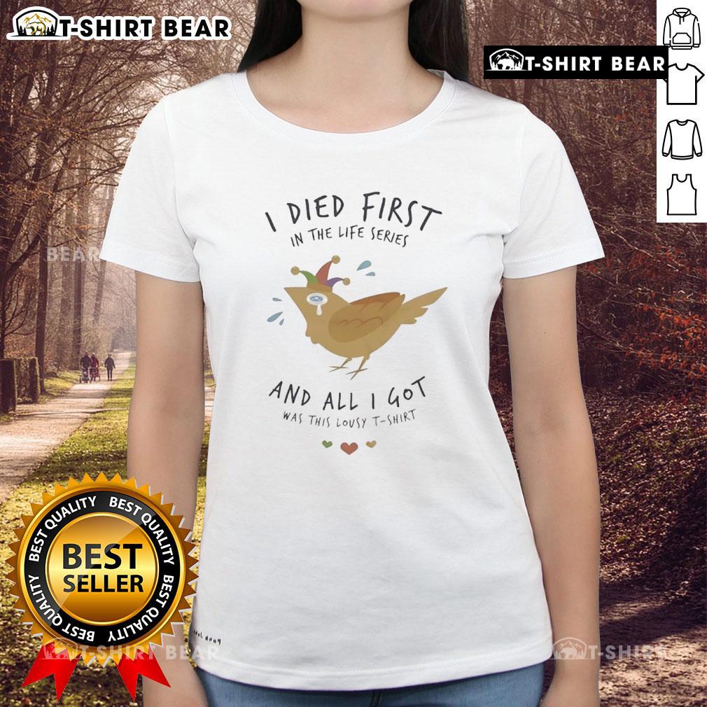 Alt Text: Top I Died First in the Life Series - Stylish ladies tee featuring bold graphic design for fans of the series.
