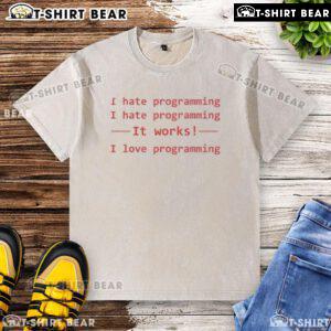 Top I Hate Programming, It Works, I Love Programming washed t-shirt design featuring playful text on a casual tee.