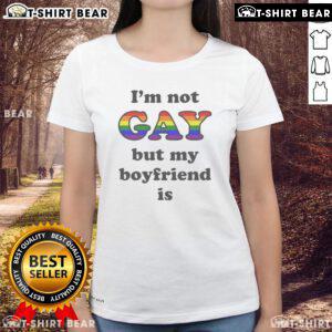 Top Im Not Gay But My Boyfriend Is Ladies Tee featuring bold text design on a stylish women's t-shirt.