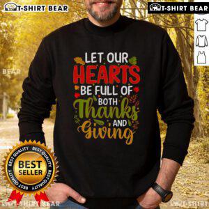 Cozy Thanksgiving sweatshirt with the phrase 'Let Our Hearts Be Full of Both' perfect for holiday celebrations.
