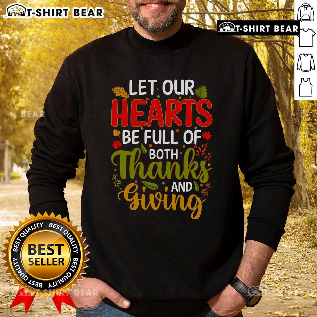Cozy Thanksgiving sweatshirt with the phrase 'Let Our Hearts Be Full of Both' perfect for holiday celebrations.