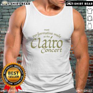 Top most performative male at the Clairo concert wearing a stylish tank top, engaging the audience with dynamic energy.