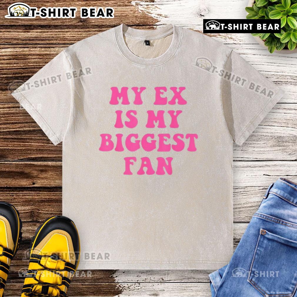 Top My Ex Is My Biggest Fan washed t-shirt displayed on a hanger, showcasing a fun and trendy design for fans.