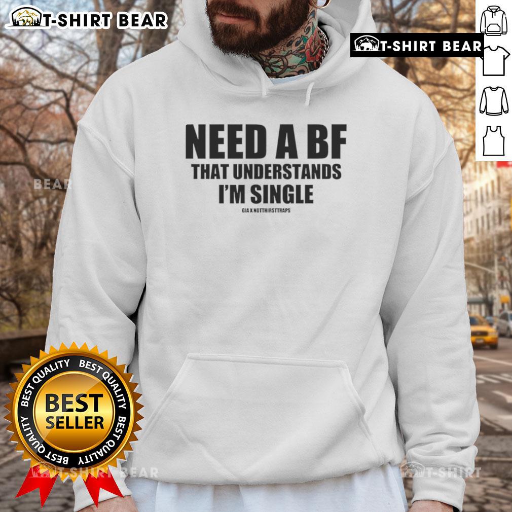 Trendy 'Need A BF That Understands I'm Single' hoodie in stylish urban setting, perfect for casual wear and self-expression.