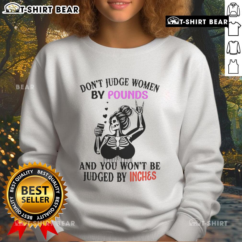 Top Skeleton sweatshirt with 'Don't Judge Women By Pounds And You Won't Be Judged By Inches' slogan in bold design.