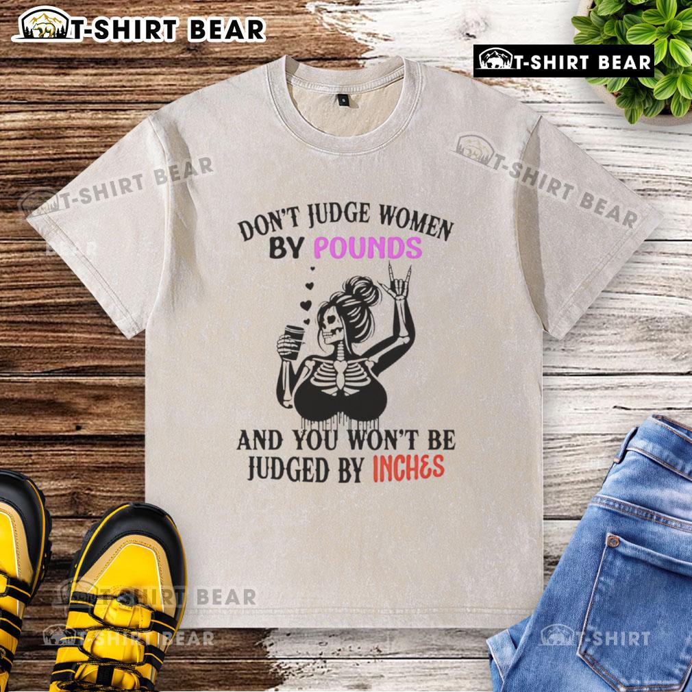 Alt Text: Top Skeleton design on a washed t-shirt with the quote 'Don't judge women by pounds and you won't be judged by inches.'