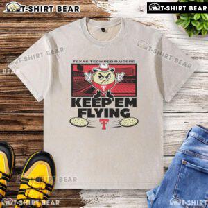 Top Texas Tech Red Raiders Football El Tortillo Keepem Flying washed t-shirt displayed on a hanger with vibrant colors.