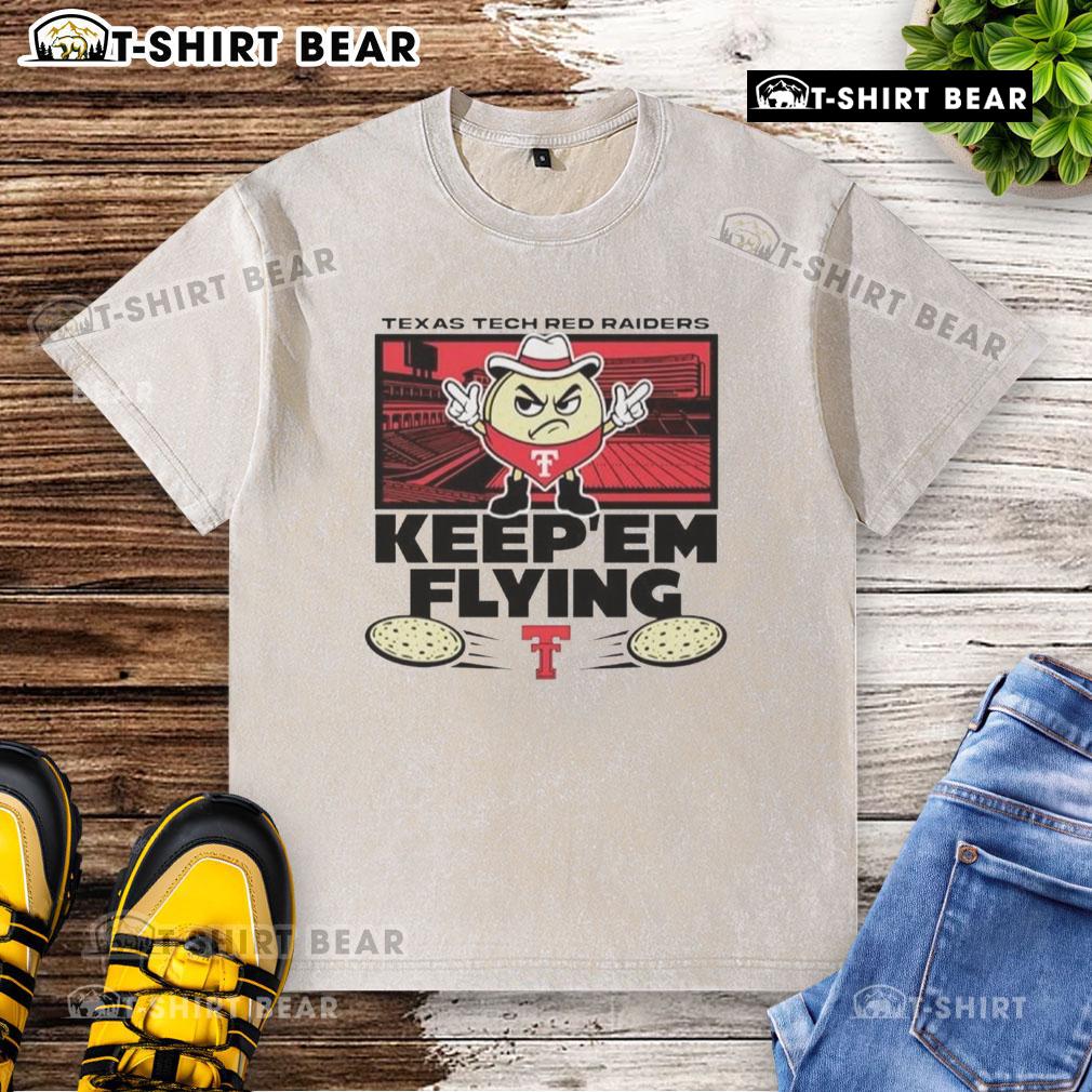 Top Texas Tech Red Raiders Football El Tortillo Keepem Flying washed t-shirt displayed on a hanger with vibrant colors.