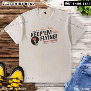 Top Texas Tech Red Raiders Football Keepem Flying flour bomb tortilla washed t-shirt displayed on a hanger.