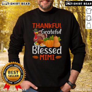 Cozy Thanksgiving sweatshirt featuring 'Thankful Grateful Blessed Mimi' text, perfect for holiday celebrations.
