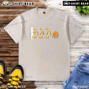 Alt Text: Good Banana Orange Knock Knock washed t-shirt featuring a playful graphic and vibrant colors for casual wear.