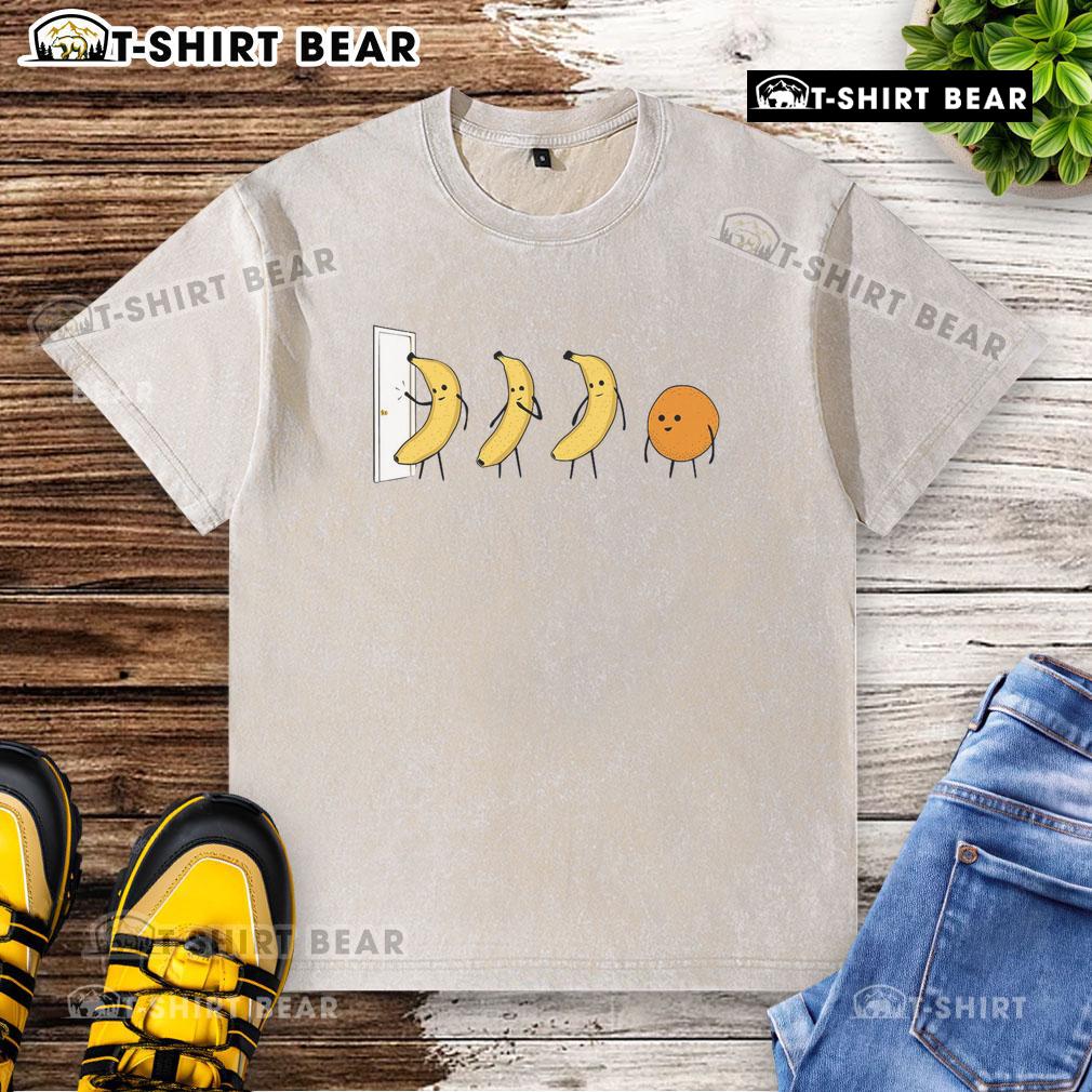 Alt Text: Good Banana Orange Knock Knock washed t-shirt featuring a playful graphic and vibrant colors for casual wear.