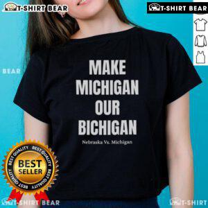 Alt Text: Nebraska vs Michigan ladies tee featuring 'Good Make Michigan Our Bichigan' design, perfect for game day style.