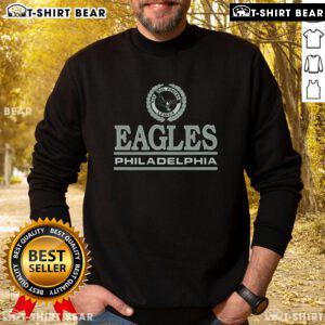 Cozy Philadelphia Eagles crest sweatshirt featuring the iconic team logo in vibrant colors, perfect for fans.