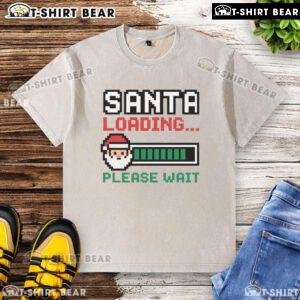 Good Santa loading pixel design on a washed t-shirt, perfect for festive casual wear this holiday season.