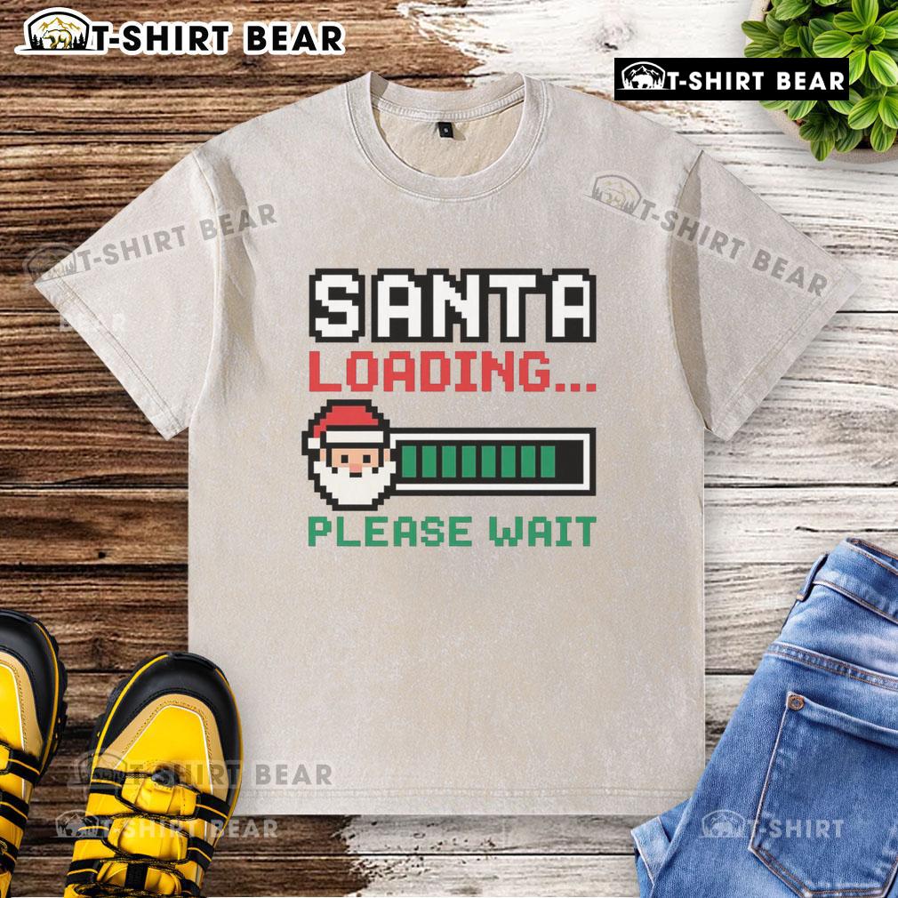 Good Santa loading pixel design on a washed t-shirt, perfect for festive casual wear this holiday season.