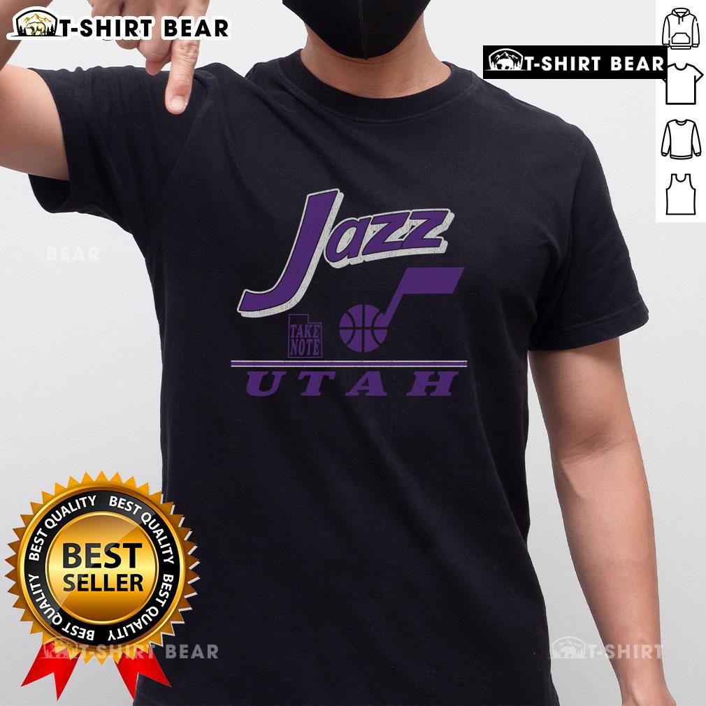 Vintage Utah Jazz Fly By T-Shirt featuring retro design and vibrant colors, perfect for basketball fans and collectors.