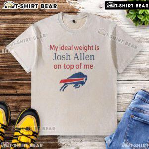 Happy fan wearing a 'My Ideal Weight Is Josh Allen' Buffalo Bills washed t-shirt, celebrating NFL spirit and team pride.