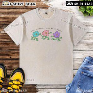Happy Spread Kindness Like Wildflowers washed t-shirt featuring vibrant floral design, perfect for casual spring outfits.