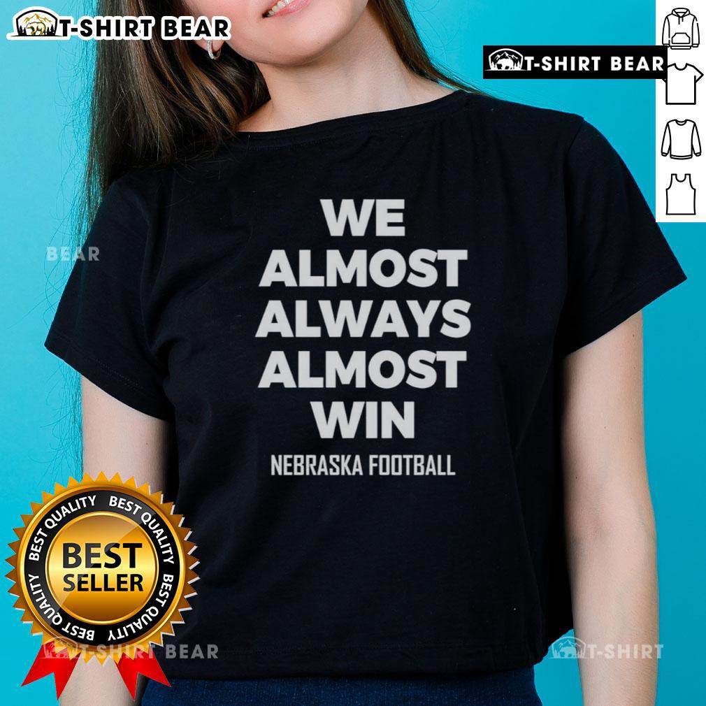 Hot We Almost Always Almost Win Nebraska Football Ladies Tee showcasing team spirit and style for female fans.