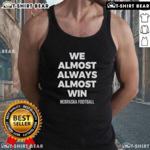 Hot We Almost Always Almost Win Nebraska Football Tank Top in red with bold graphics, perfect for fans showing team spirit.