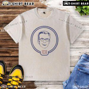 Nice Alex Cora Tom Caron TC30 washed t-shirt displayed on a wooden background, showcasing its casual style and comfortable fit.