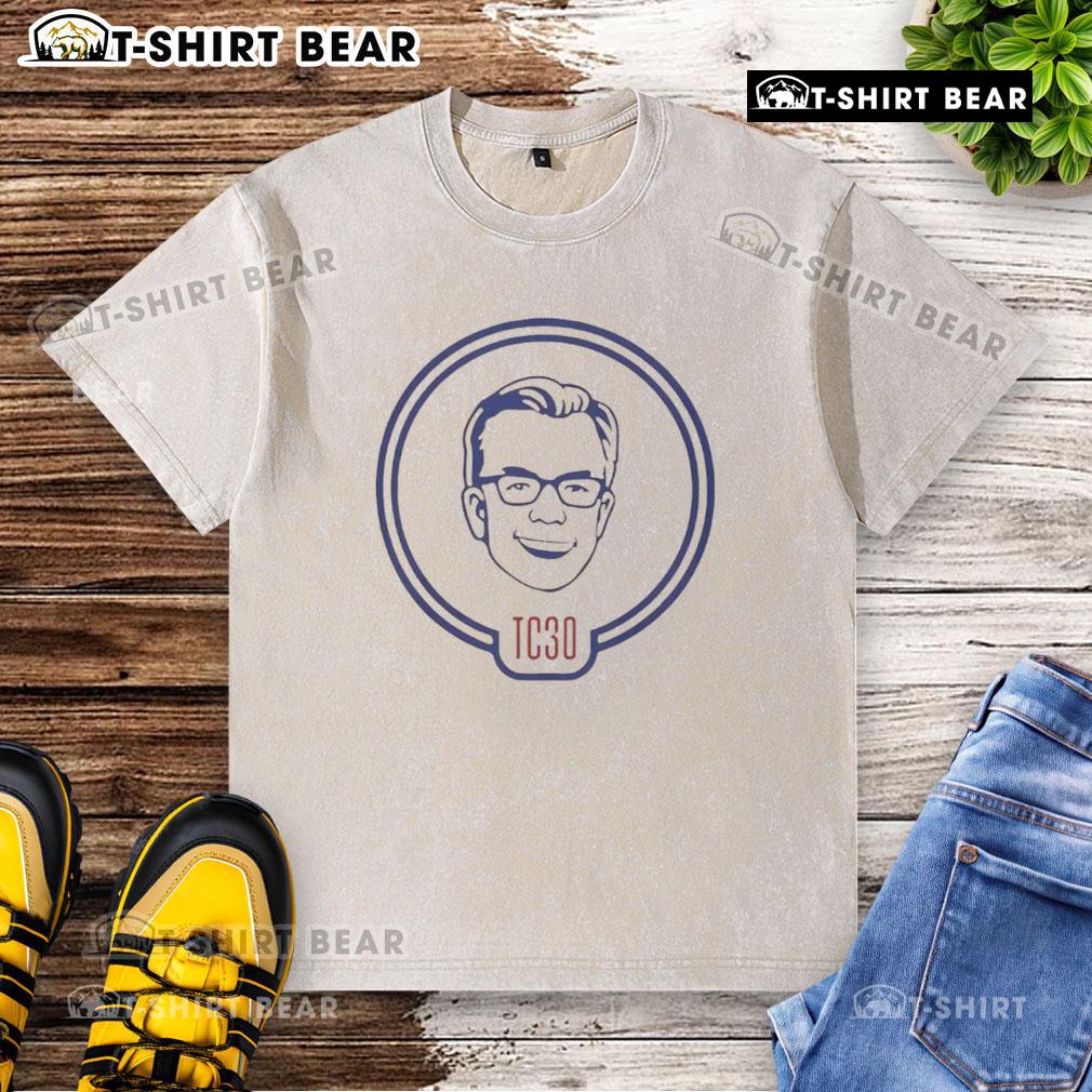 Nice Alex Cora Tom Caron TC30 washed t-shirt displayed on a wooden background, showcasing its casual style and comfortable fit.