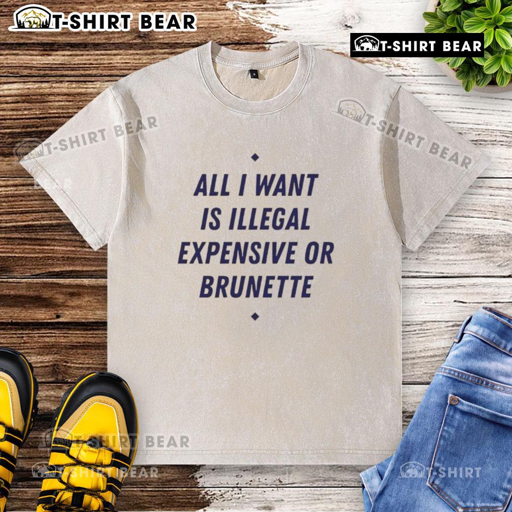 Brunette washed t-shirt with 'All I Want Is Illegal & Expensive' slogan, perfect for casual style and statement wear.