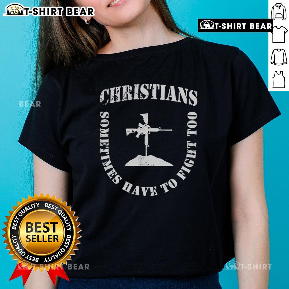Women in 'Nice Christians Sometimes Have to Fight Too' t-shirts showcasing shield formation for strength and unity.