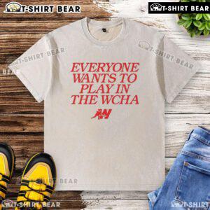 Nice Everyone Wants to Play in the WCHA Washed T-Shirt displayed on a mannequin, showcasing its soft fabric and stylish design.