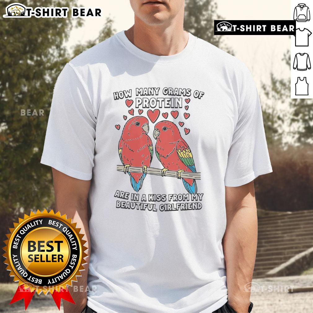 Funny t-shirt design: 'How Many Grams Of Protein Are In A Kiss From My Beautiful Girlfriend' with playful graphics.