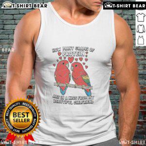 Alt Text: Woman wearing a tank top with 'How Many Grams of Protein Are in a Kiss?' design, showcasing playful style.