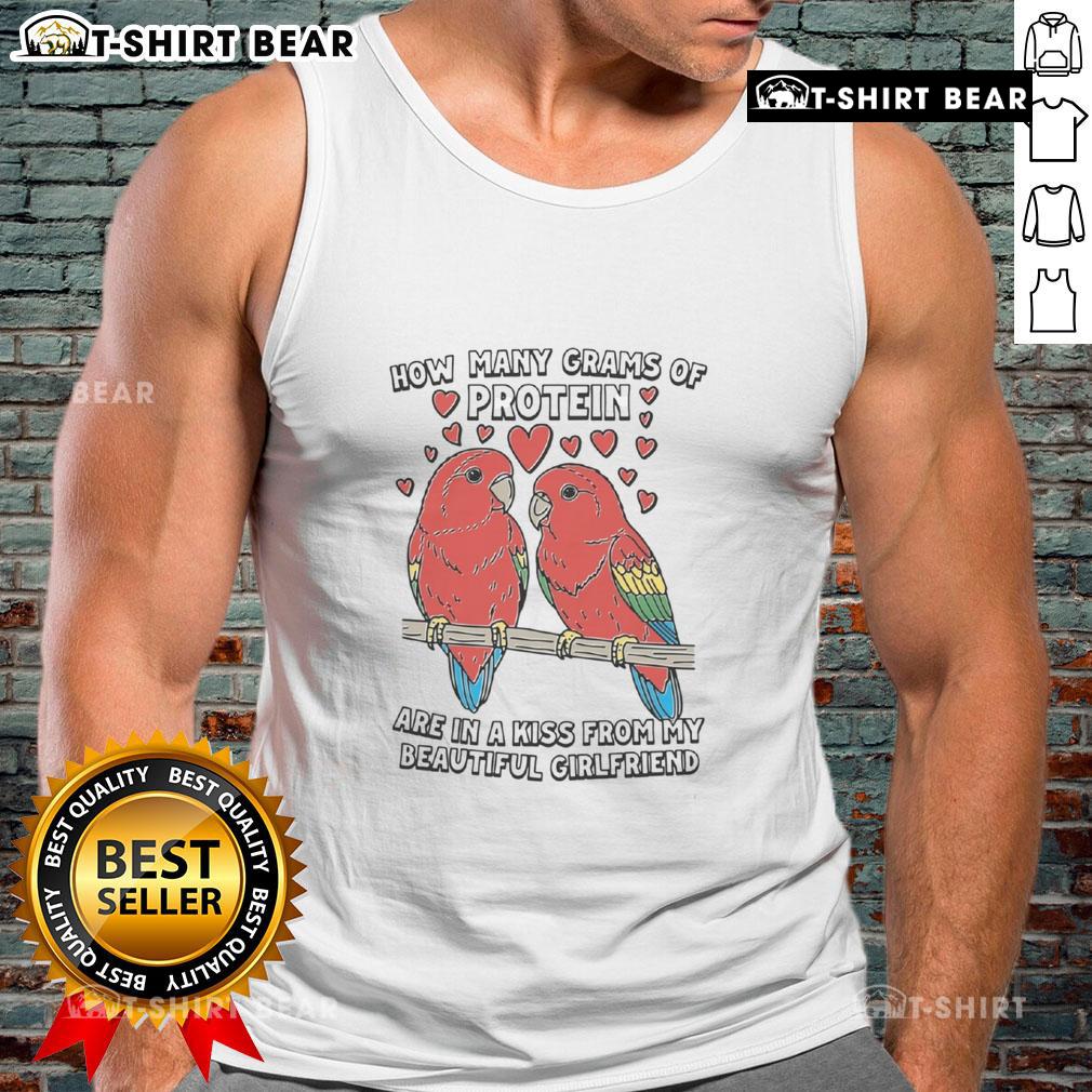 Alt Text: Woman wearing a tank top with 'How Many Grams of Protein Are in a Kiss?' design, showcasing playful style.