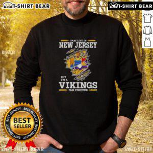 Cozy sweatshirt with 'I May Live In New Jersey But I'm A Minnesota Vikings Fan Forever' design for dedicated fans.
