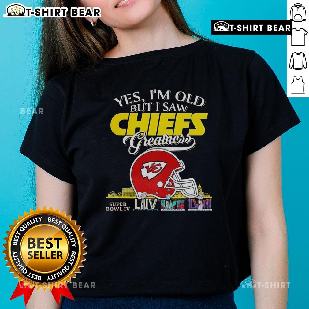 Official Kansas City Chiefs Super Bowl helmet skyline graphic on ladies' tee, celebrating vintage fandom and team greatness.
