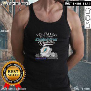 Tank top featuring Miami Dolphins Super Bowl helmet and skyline, perfect for fans celebrating their team's greatness.