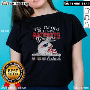 New England Patriots greatness tee featuring a Super Bowl helmet and skyline design for ladies celebrating football history.