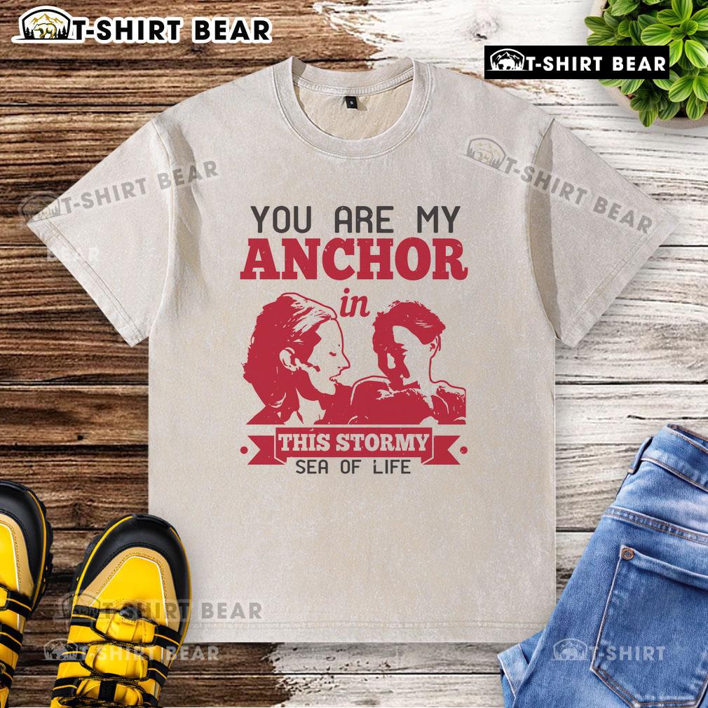 Official You Are My Anchor In This Stormy Sea Of Life washed T-shirt displayed on a wooden background.