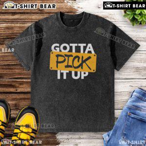 Original Gotta Pick It Up The Challenge washed t-shirt in a casual setting, showcasing its unique design and style.