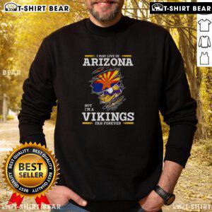 Cozy sweatshirt featuring 'I May Live In Arizona But I'm A Minnesota Vikings Fan Forever' design, perfect for loyal fans.