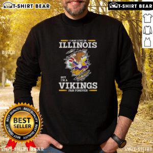 Cozy sweatshirt featuring 'I May Live In Illinois But I'm A Minnesota Vikings Fan Forever' design for dedicated fans.